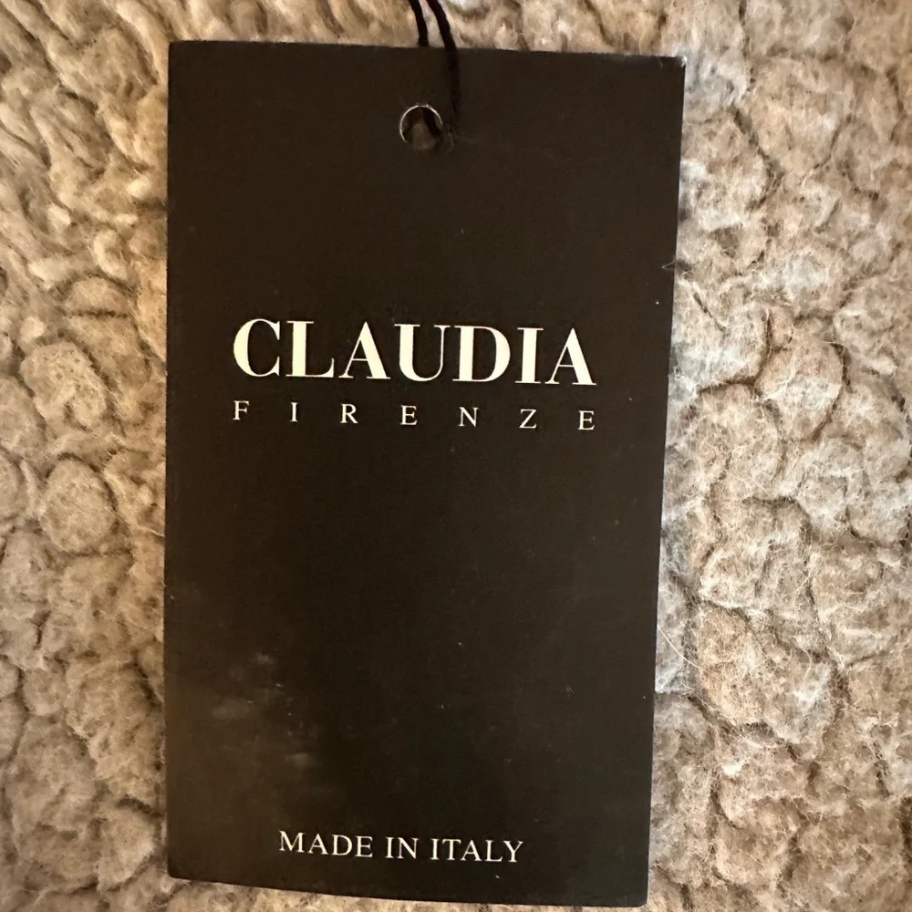 Claudia Firenze stylish tan